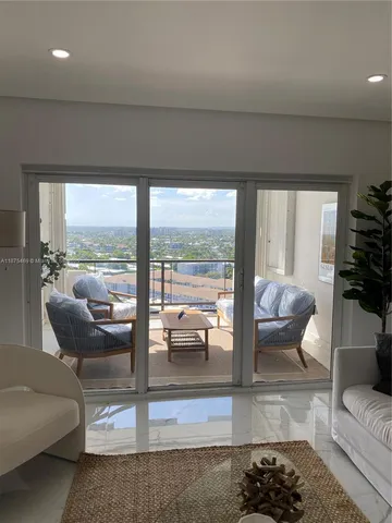 a view of city with tall buildings