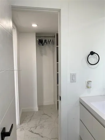 a view of entryway with stairs and a window