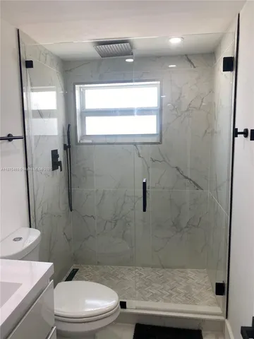 a utility room with washer and dryer