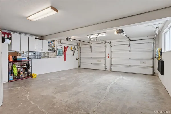 a view of a garage with storage