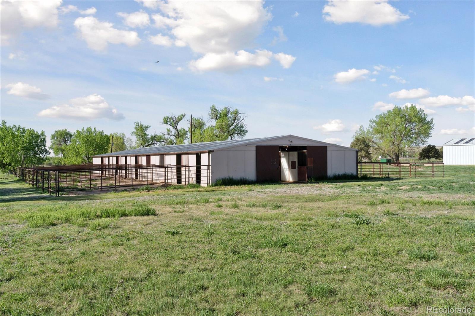16990 Old Pueblo Road Fountain, CO 80817 - Photo 42 of 50 a view of a big yard with an outdoor space