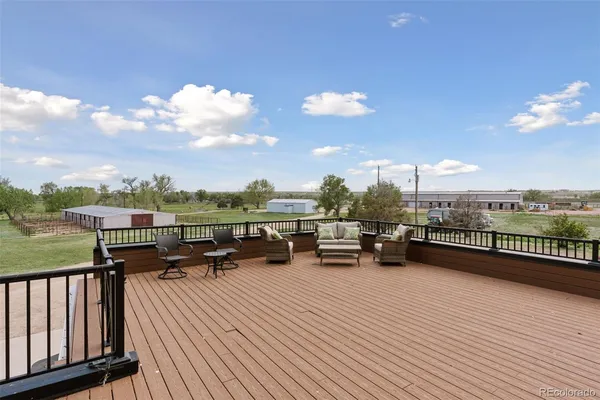 a view of a terrace with sitting area