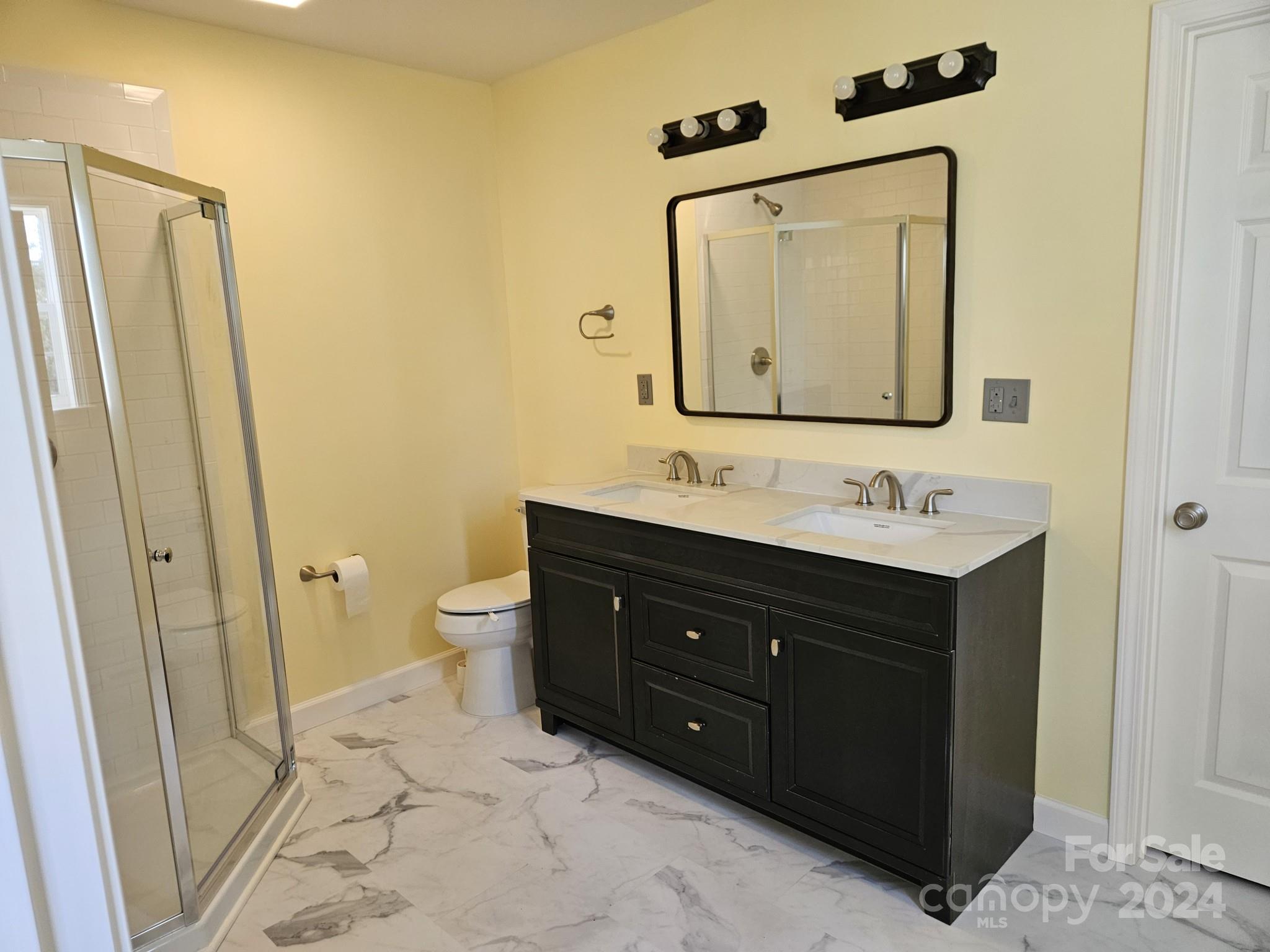 125 Diamond Loop Rutherfordton, NC 28139 - Photo 14 of 28 a bathroom with a sink vanity granite and toilet