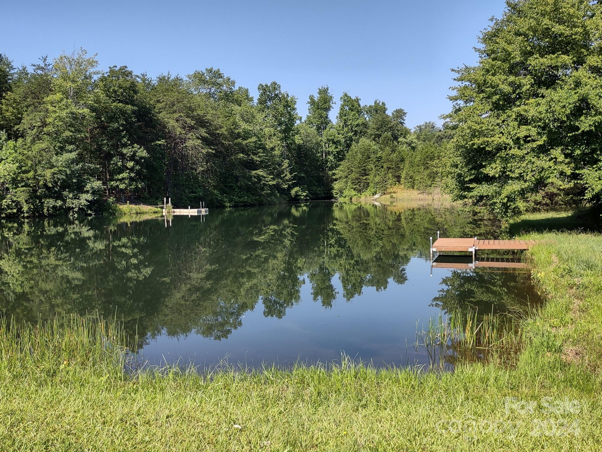 125 Diamond Loop Rutherfordton, NC 28139 - Photo 25 of 28 a backyard of a house with lots of green space