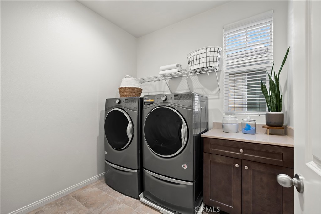 692 South Brampton Avenue Rialto, CA 92376 - Photo 12 of 21 a utility room with dryer and washer