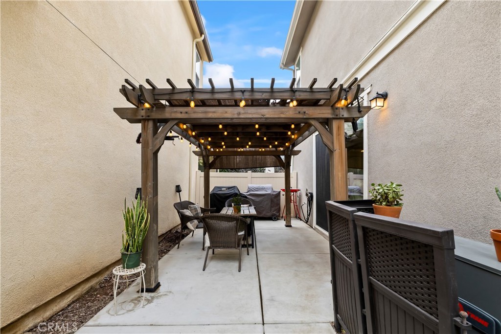692 South Brampton Avenue Rialto, CA 92376 - Photo 19 of 21 a living room with furniture and a potted plant