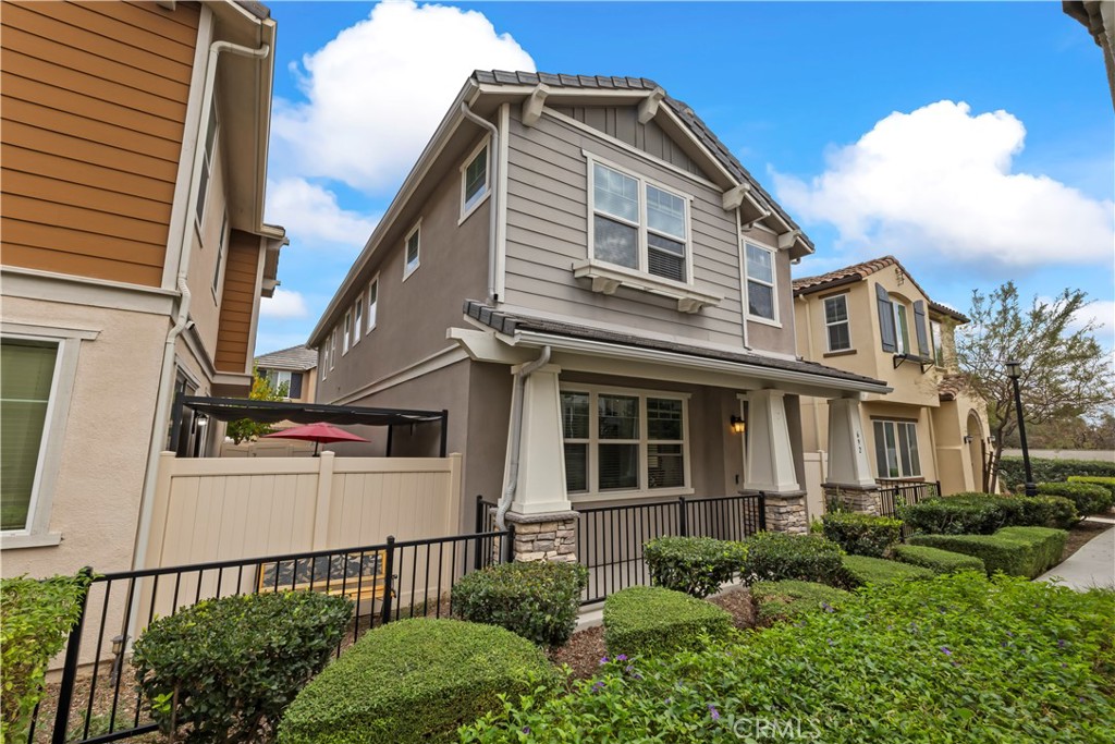 692 South Brampton Avenue Rialto, CA 92376 - Photo 21 of 21 a view of a house with wooden fence
