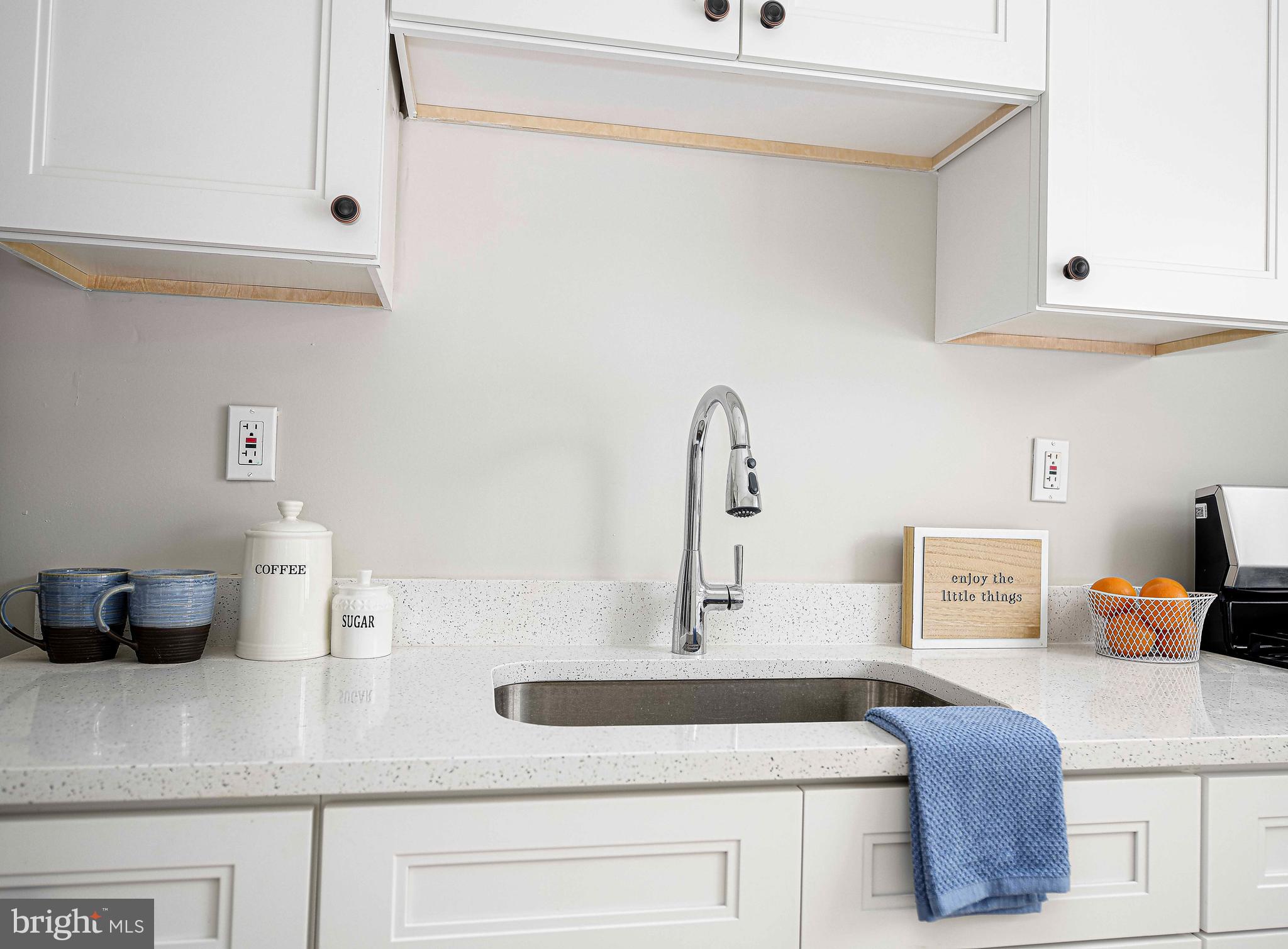747 Middlesex Road Baltimore, MD 21221 - Photo 11 of 25 a kitchen with a sink and cabinets