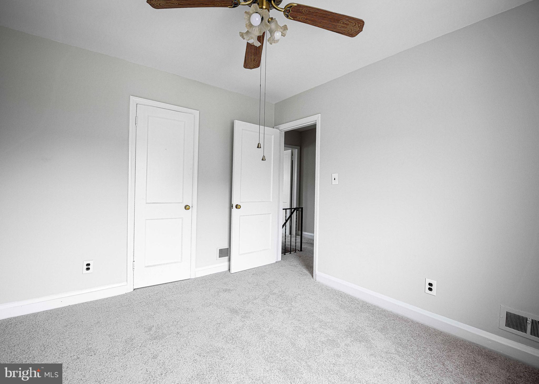 747 Middlesex Road Baltimore, MD 21221 - Photo 19 of 25 a view of an empty room