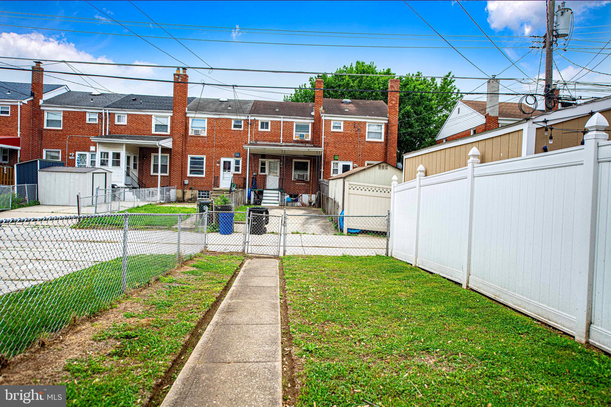 747 Middlesex Road Baltimore, MD 21221 - Photo 25 of 25 a view of a house with a yard
