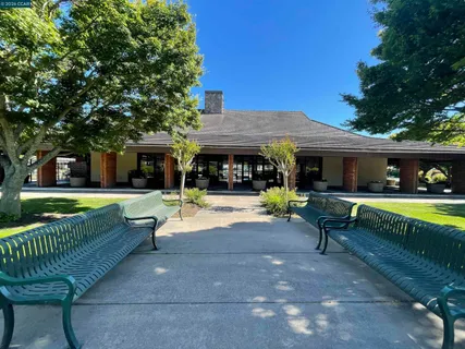 a view of a house with a big yard