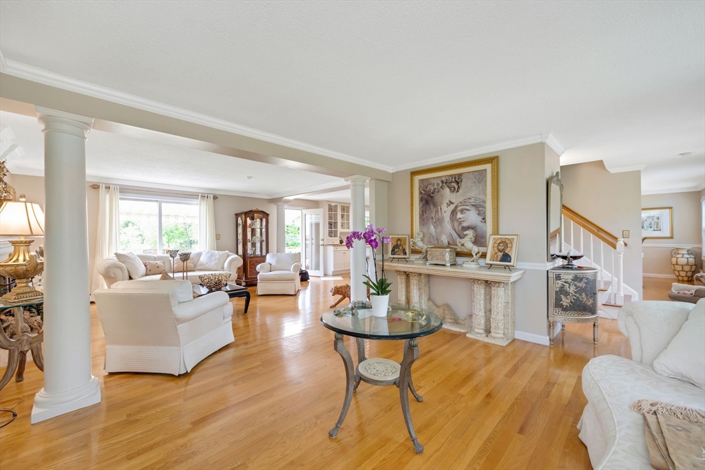 63 Parker Road Shirley, MA 01464 - Photo 3 of 32 a living room with furniture and a wooden floor