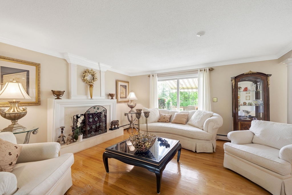 63 Parker Road Shirley, MA 01464 - Photo 4 of 32 a living room with furniture and a large window