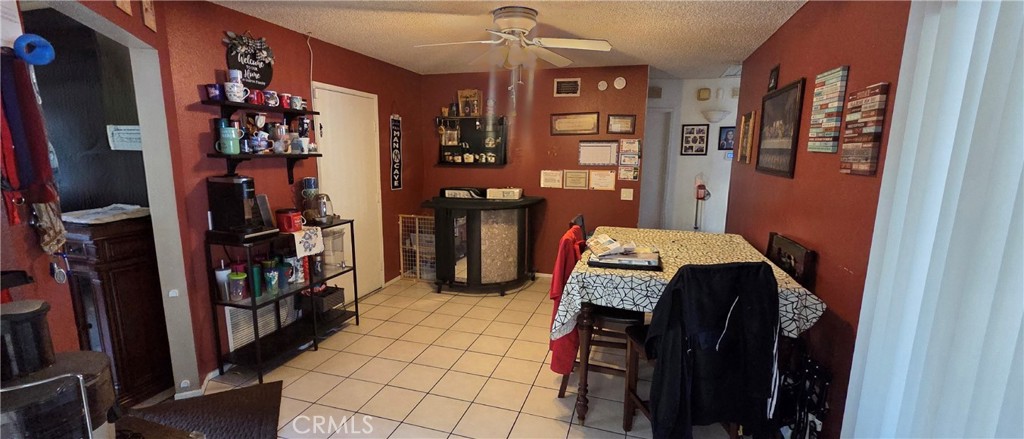 1548 Ranch Road San Bernardino, CA 92407 - Photo 7 of 26 a view of walk in closet with clothes and shoes