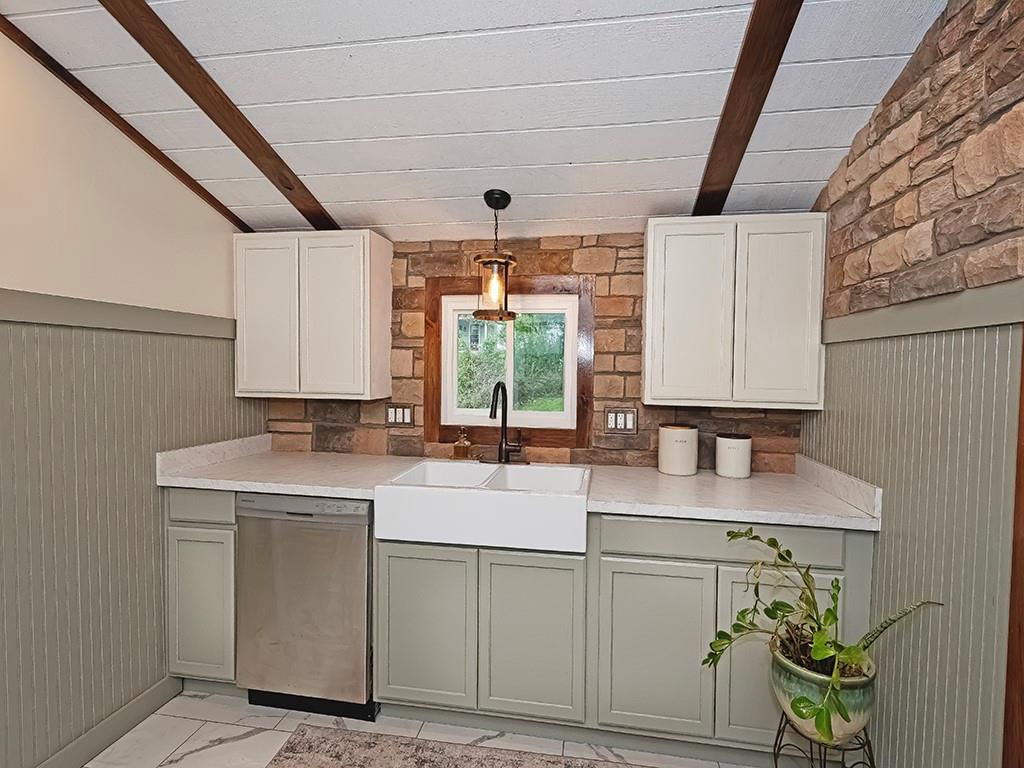 447 Winfield Road Cabot, PA 16023 - Photo 14 of 28 a kitchen with a sink stove and cabinets