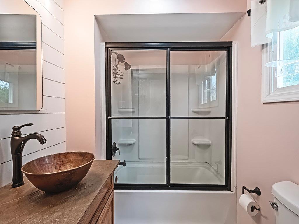 447 Winfield Road Cabot, PA 16023 - Photo 23 of 28 a bathroom with a sink and a mirror