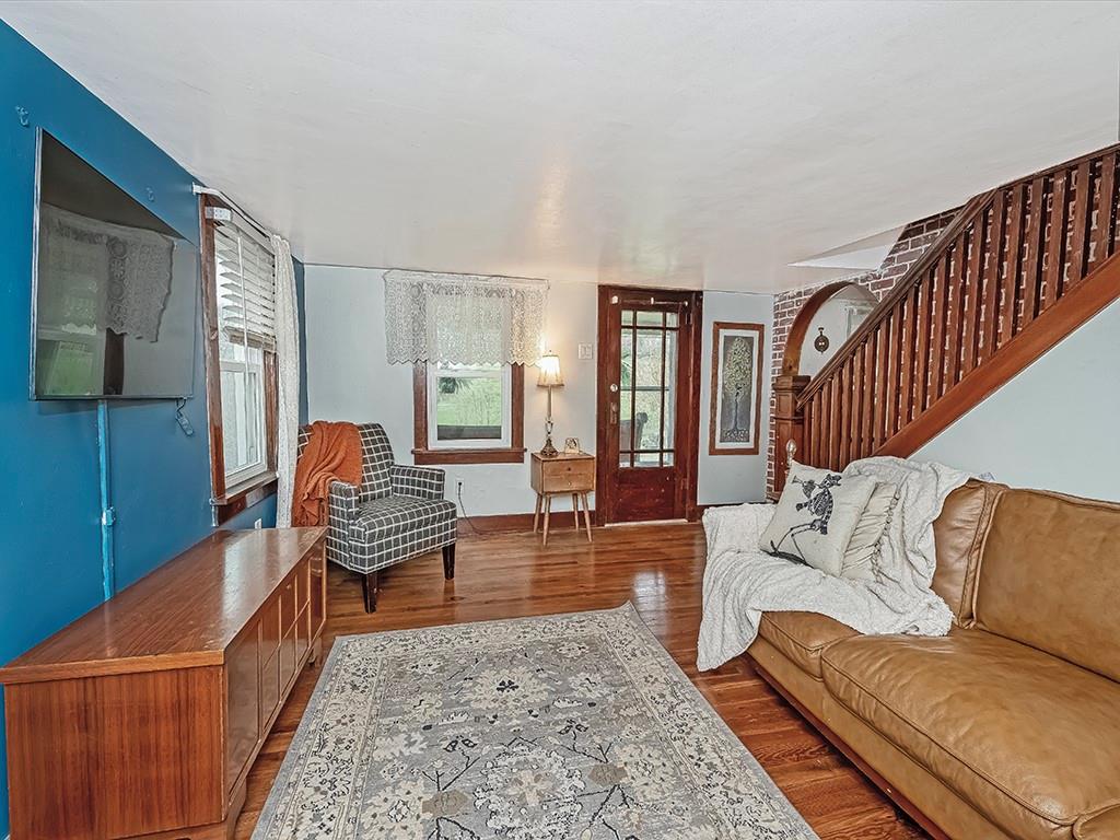 447 Winfield Road Cabot, PA 16023 - Photo 4 of 28 a living room with furniture and a rug