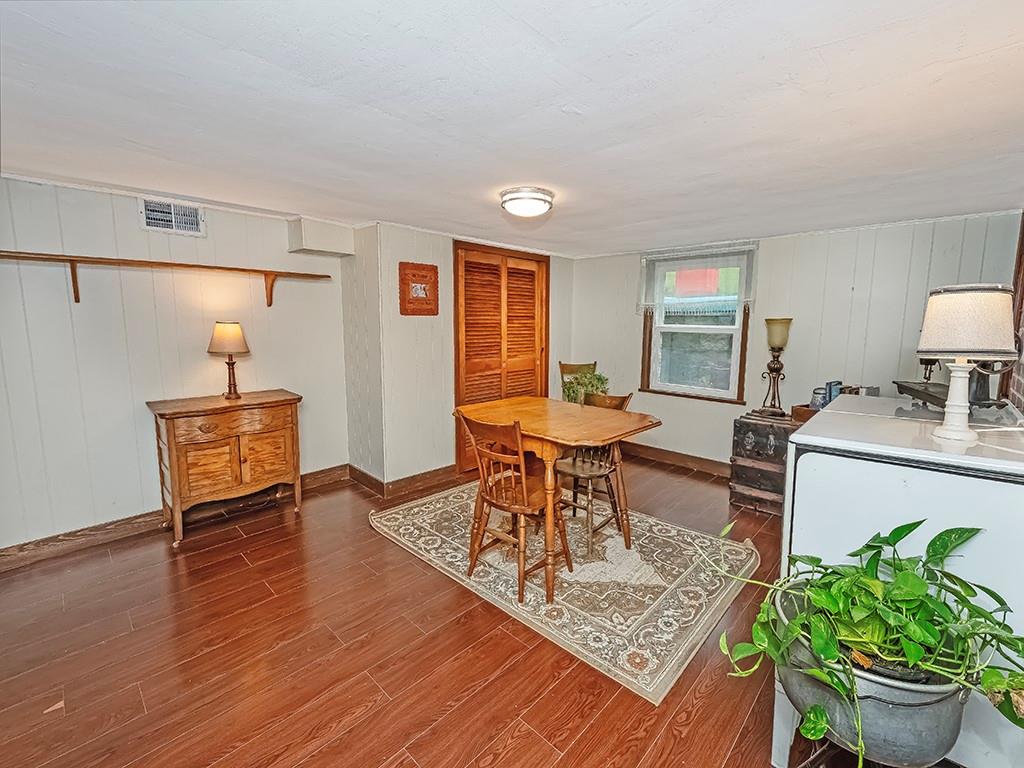 447 Winfield Road Cabot, PA 16023 - Photo 9 of 28 a living room with furniture and a wooden floor