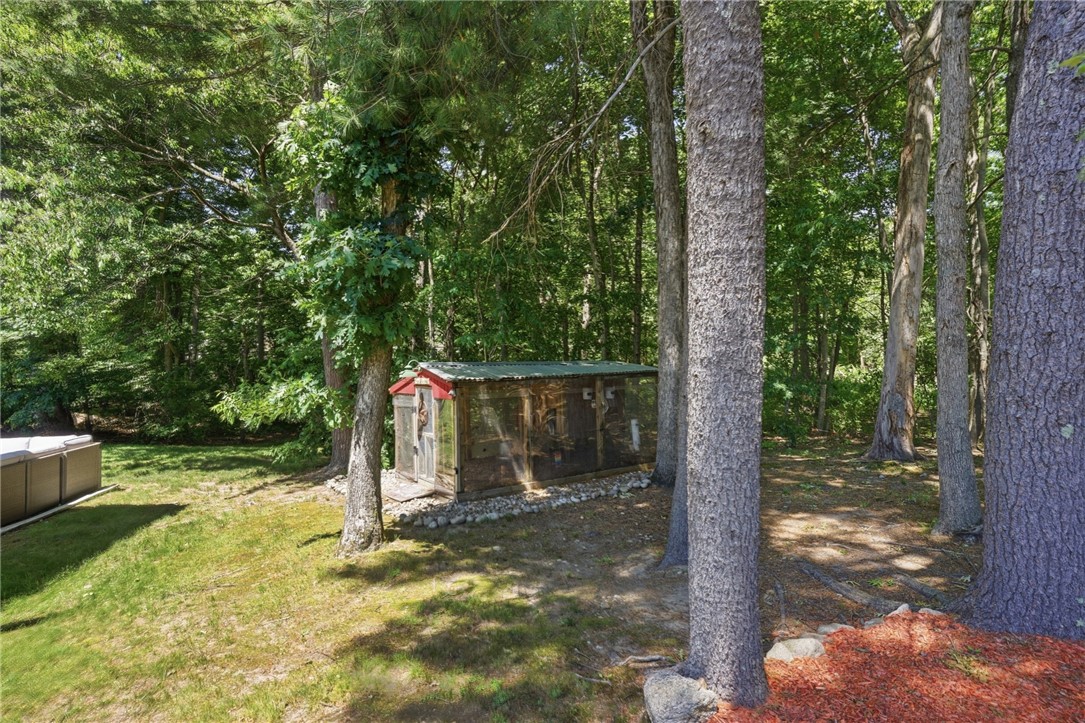 26 King Street Coventry, RI 02816 - Photo 14 of 50 Side yard with chicken coop and shed to the right