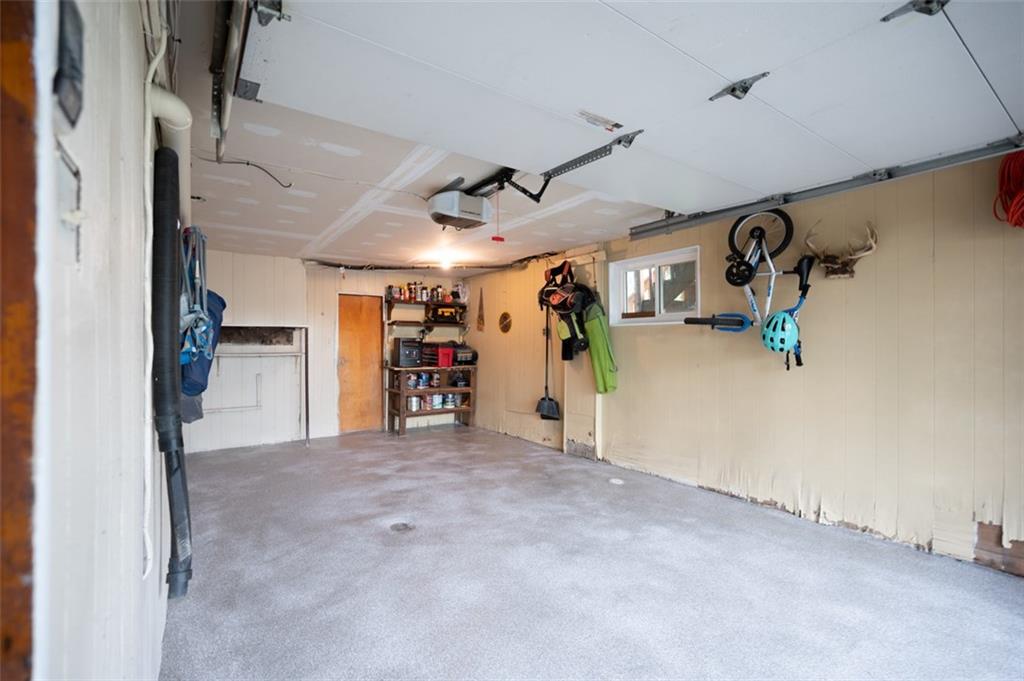 100 Church Road Leechburg, PA 15656 - Photo 21 of 21 Nice Size Garage with Belt Driven Chamberlain Quiet Garage Door Opener. Garage will Accommodate an Explorer Size SUV.