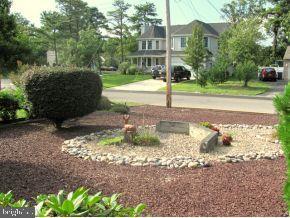 160 Captain Road Manahawkin, NJ 08050 - Photo 2 of 24 a view of a street with a building in the background