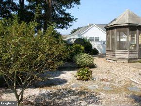 160 Captain Road Manahawkin, NJ 08050 - Photo 22 of 24 a view of a house with a yard