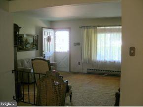 160 Captain Road Manahawkin, NJ 08050 - Photo 7 of 24 a room with furniture and a window