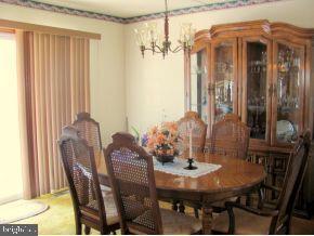160 Captain Road Manahawkin, NJ 08050 - Photo 10 of 24 a view of a dining room with furniture and window