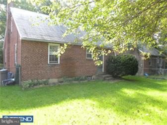 14 Preston Road Media, PA 19063 - Photo 7 of 7 a view of a backyard with plants and large trees