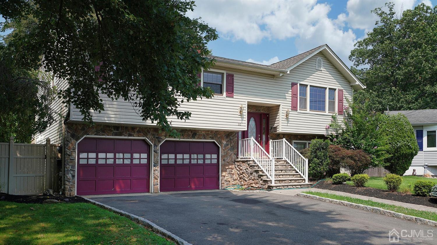 50 Meyer Road Edison, NJ 08817 - Photo 3 of 31 a front view of a house with a yard