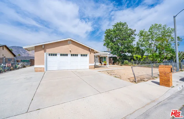 a house with trees in front of it