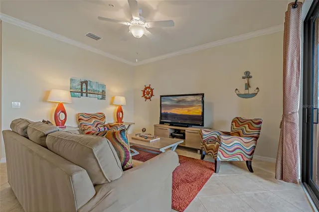 a view of a dining room with furniture and window