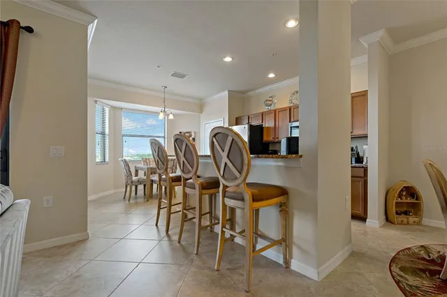 a bedroom with a bed and a mirror