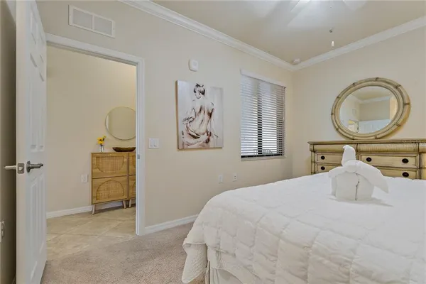 a balcony with chairs and city view