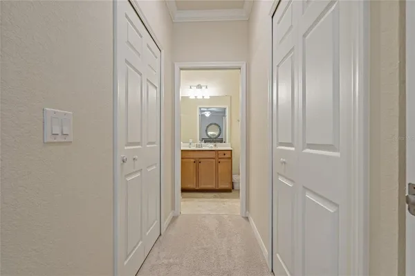 a view of a hallway with front door
