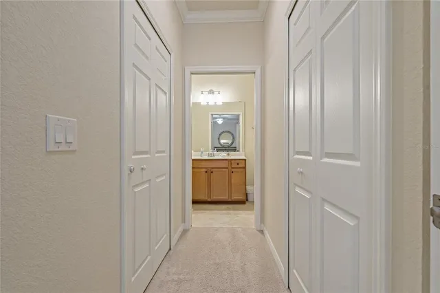 a view of a hallway with front door