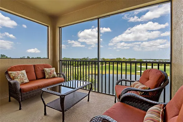 aerial view of a house with outdoor space and swimming pool