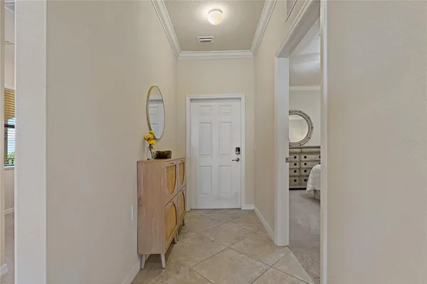 an aerial view of a house with a lake view