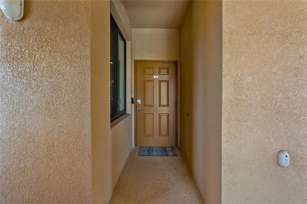 an aerial view of a house with a lake view