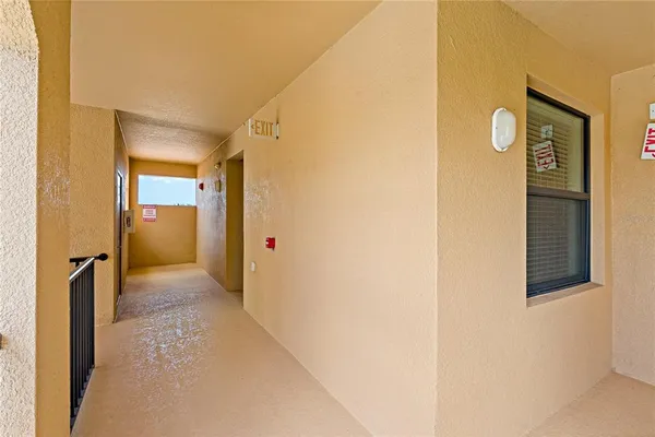 an aerial view of a house with a ocean view