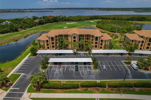 an aerial view of a pool patio patio and outdoor seating
