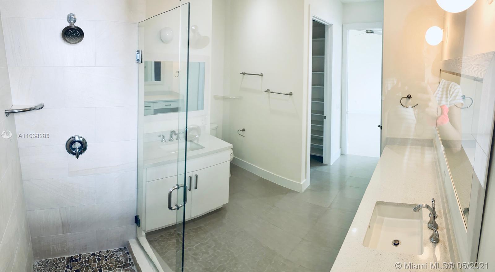 3318 Day Avenue, Unit 2 Miami, FL 33133 - Photo 14 of 29 a bathroom with a shower