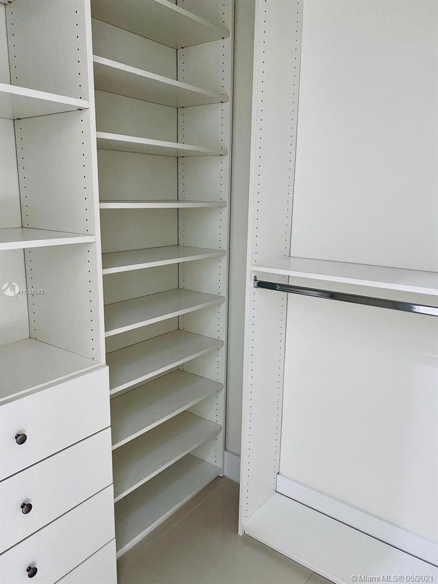 3318 Day Avenue, Unit 2 Miami, FL 33133 - Photo 18 of 29 a view of walk in closet with empty racks