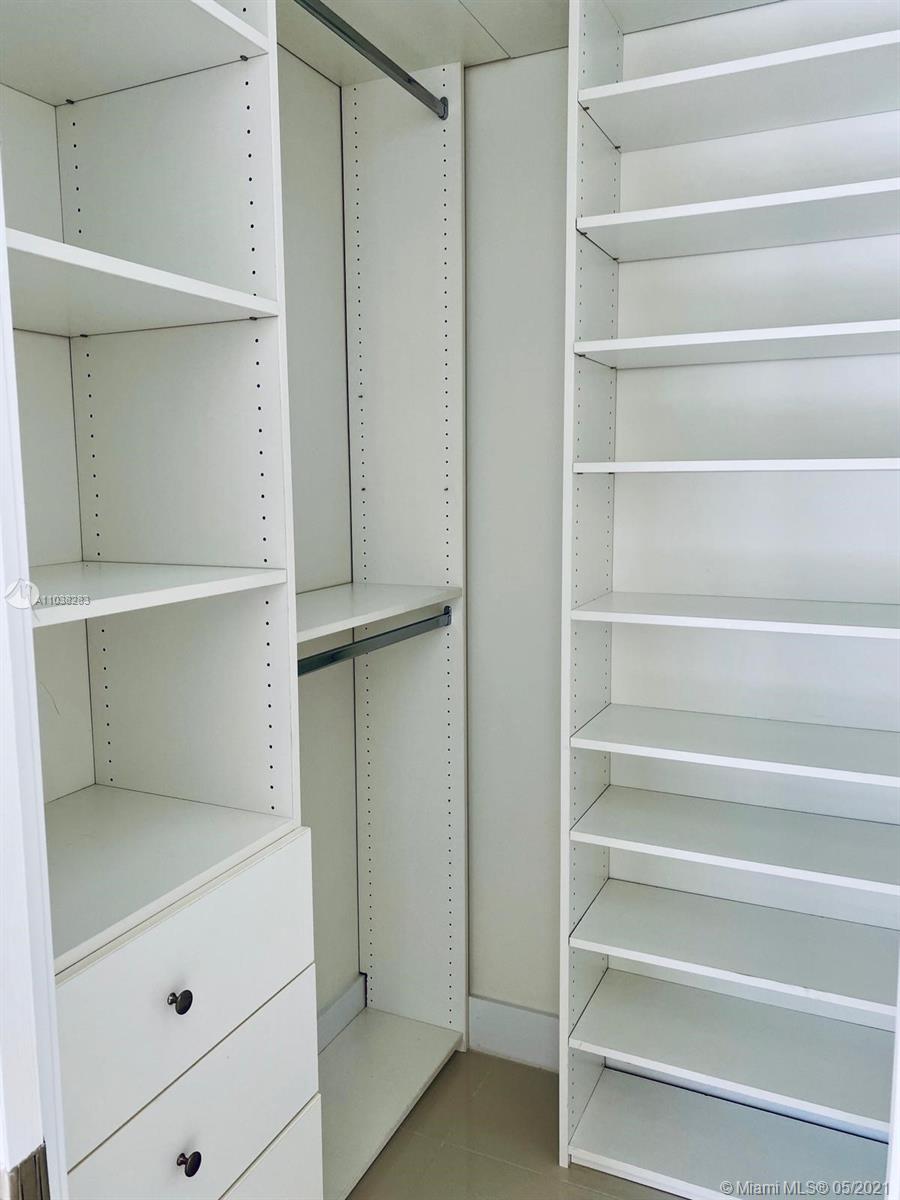 3318 Day Avenue, Unit 2 Miami, FL 33133 - Photo 19 of 29 a view of walk in closet with empty racks