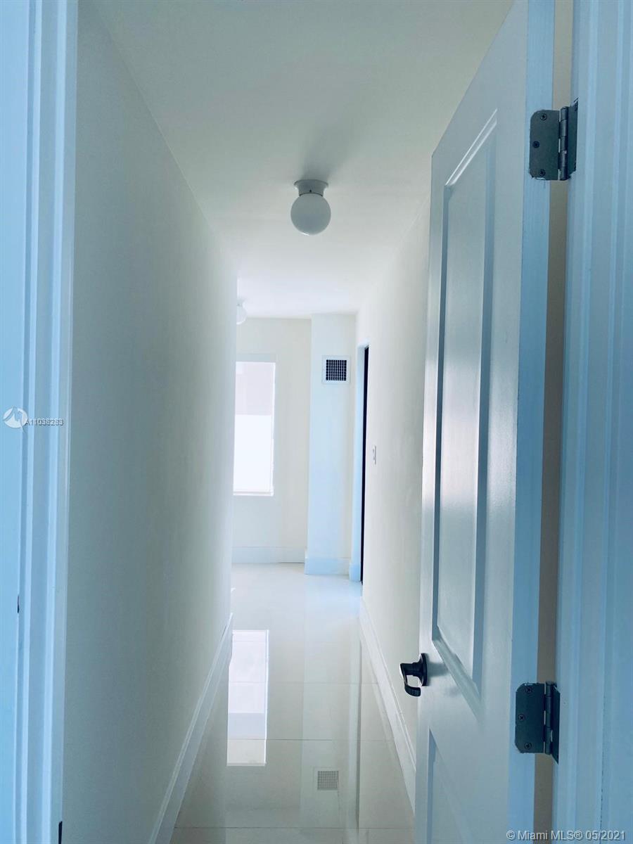 3318 Day Avenue, Unit 2 Miami, FL 33133 - Photo 20 of 29 a bathroom with a shower