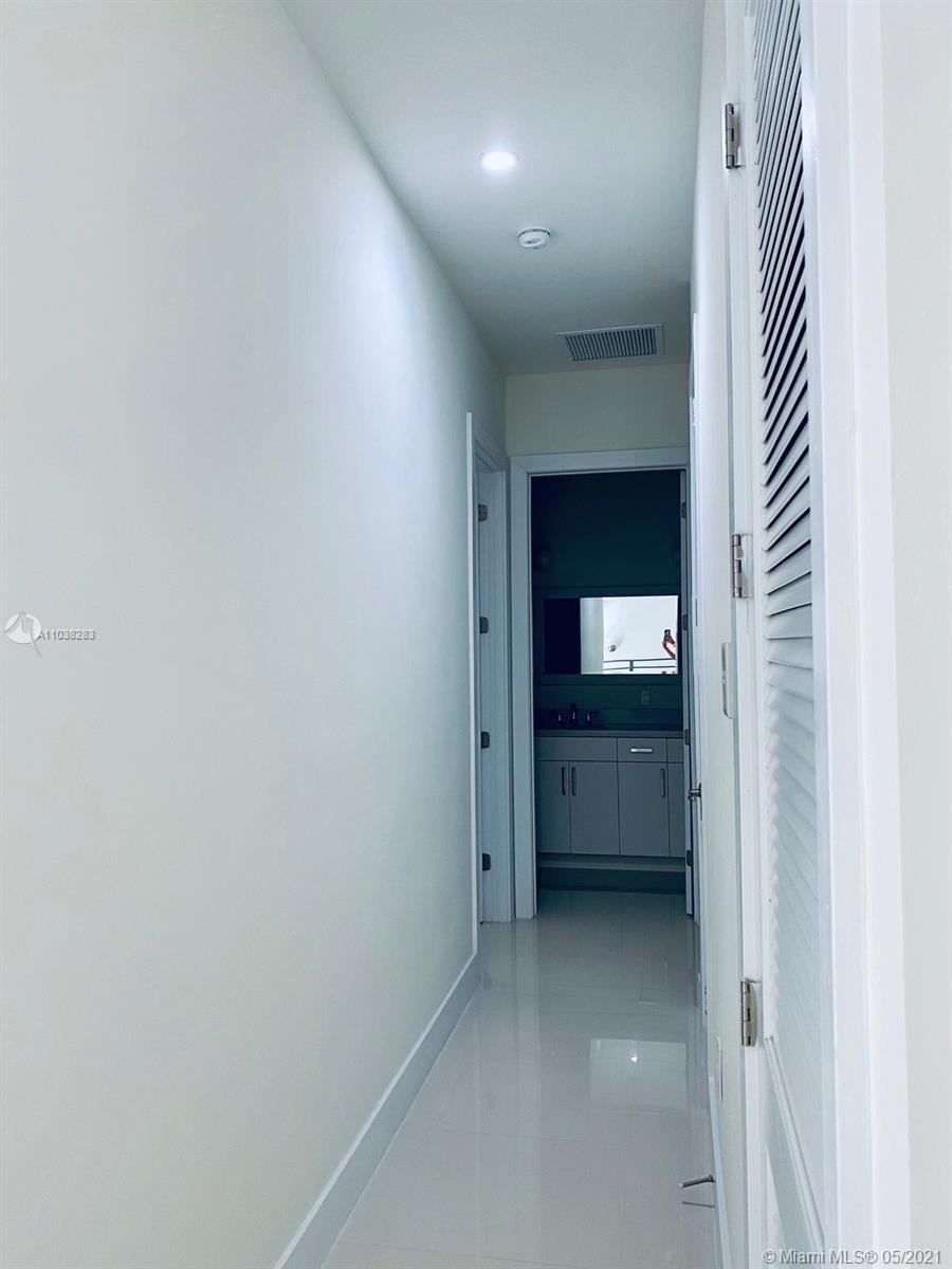 3318 Day Avenue, Unit 2 Miami, FL 33133 - Photo 22 of 29 a view of kitchen with a sink and a refrigerator