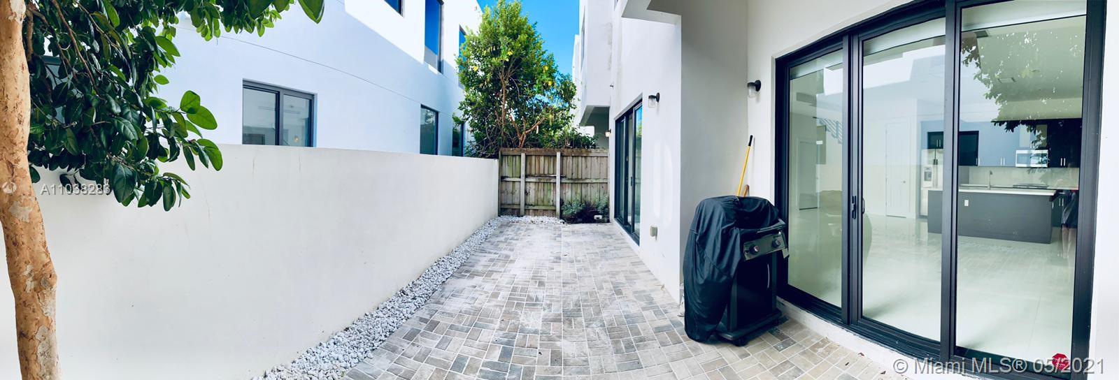 3318 Day Avenue, Unit 2 Miami, FL 33133 - Photo 24 of 29 a view of a corridor