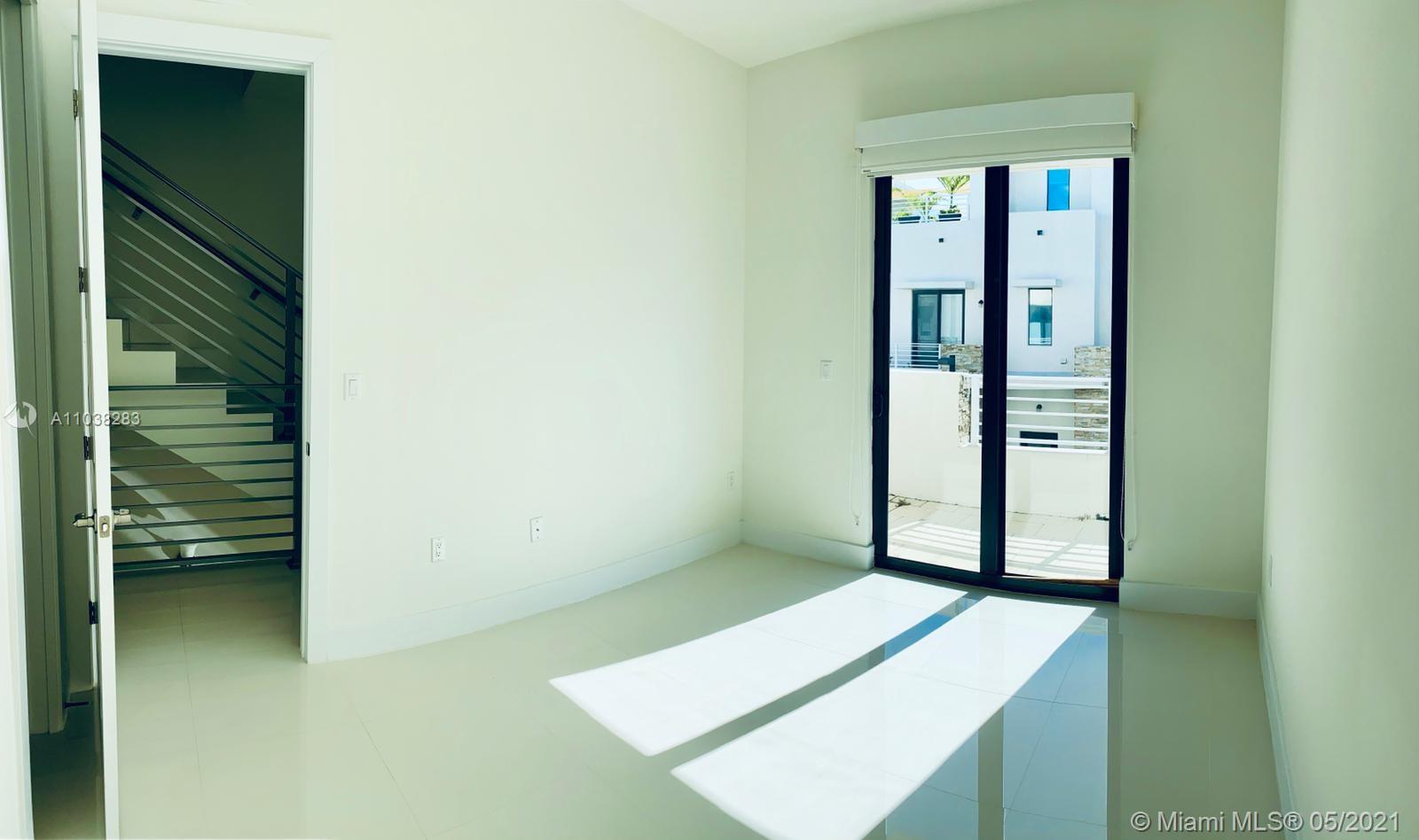 3318 Day Avenue, Unit 2 Miami, FL 33133 - Photo 10 of 29 a view of an entryway with a window