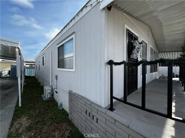a view of a patio with chair and tables
