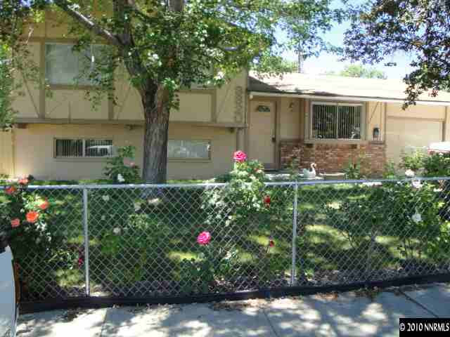 3320 Kings Row Reno, NV 89503 - Photo 1 of 9 a small garden covered with flower plants